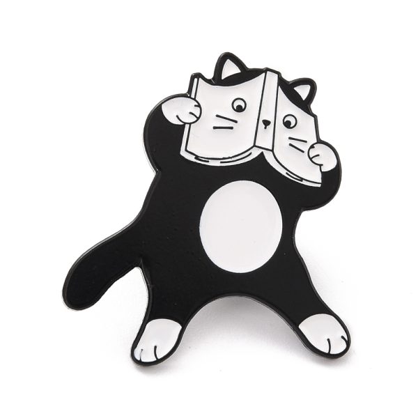 pin γάτα με βιβλίο